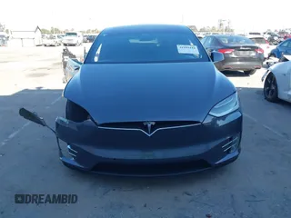 2018 Tesla Model X 75D with VIN 5YJXCDE28JF142509, listed as a IAAI auction lot 41993444 with 100,244 mi miles and . Bid and sale history available at carsss.com. Image 12.