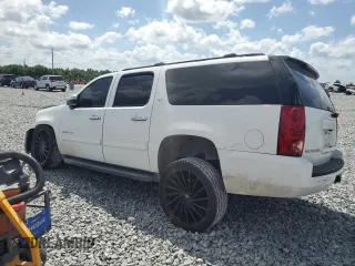 2013 GMC Yukon XL SLT with VIN 1GKS1KE03DR253071, listed as a Copart auction lot 51437355 with 194,807 mi miles and Salvage Title. Bid and sale history available at DreamBid. Image 2.
