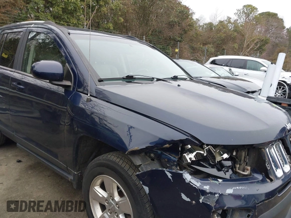 2014 Jeep Compass High Altitude with VIN 1C4NJCEA8ED522686, listed as a IAAI auction lot 41611351 with 220,145 mi miles and . Bid and sale history available at DreamBid. Image 13.