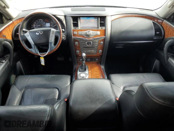 2015 Infiniti QX80 z VIN JN8AZ2ND5F9770320, wystawiony jako Copart lot #55305965 z przebiegiem 168 832 mil mil oraz Czysty tytuł • Clean title. Historia ofert i sprzedaży dostępna na DreamBid. Obrazek 8.