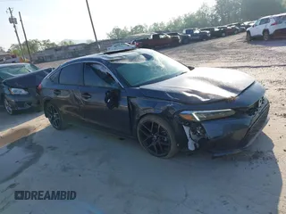 2023 Honda Civic Sport Touring z VIN 19XFL1H8XPE006441, wystawiony jako IAAI lot #42150950 z przebiegiem 21 752 mil mil oraz . Historia ofert i sprzedaży dostępna na DreamBid. Obrazek 1.