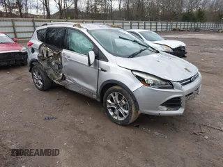 2014 Ford Escape Titanium with VIN 1FMCU9J94EUE51012, listed as a IAAI auction lot 41497105 with 153,031 mi miles. Bid and sale history available at carsss.com. Image 1.