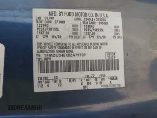 1999 Ford Explorer XLT z VIN 1FMDU34EXXZA79739, wystawiony jako IAAI lot #42353736 z przebiegiem 377 224 mil mil oraz . Historia ofert i sprzedaży dostępna na DreamBid. Obrazek 9.