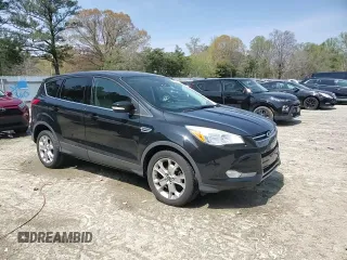 2013 Ford Escape SEL with VIN 1FMCU0HX4DUC48961, listed as a Copart auction lot 52630795 with 179,786 mi miles and Salvage Title. Bid and sale history available at DreamBid. Image 14.