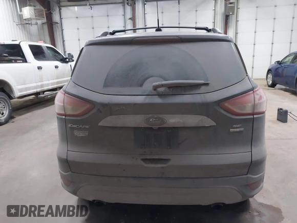 2014 Ford Escape SE with VIN 1FMCU9GXXEUD09124, listed as a IAAI auction lot 41747925 with 147,996 mi miles and . Bid and sale history available at DreamBid. Image 15.