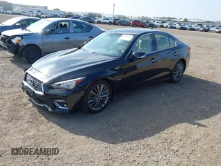 2019 Infiniti Q50 Luxe with VIN JN1EV7AP8KM543395, listed as a IAAI auction lot 42418112 with 43,382 mi miles and . Bid and sale history available at DreamBid. Image 2.
