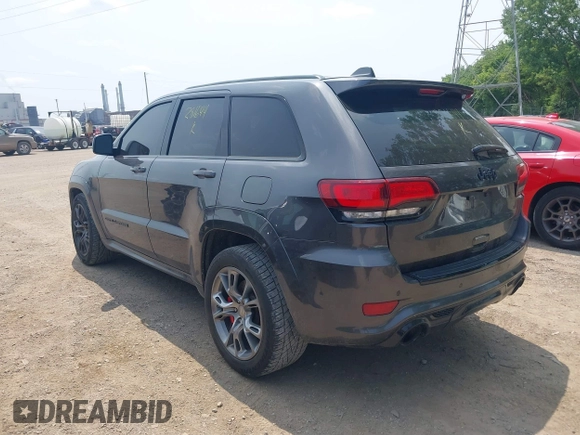 2018 Jeep Grand Cherokee SRT z VIN 1C4RJFDJ7JC281644, wystawiony jako IAAI lot #42481239 z przebiegiem 160 218 mil mil oraz . Historia ofert i sprzedaży dostępna na DreamBid. Obrazek 3.