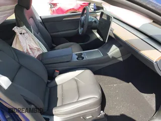 2024 Tesla Model Y Long Range z VIN 7SAYGAEE0RF074822, wystawiony jako IAAI lot #42098821 z przebiegiem Nie podano mil oraz . Historia ofert i sprzedaży dostępna na DreamBid. Obrazek 5.