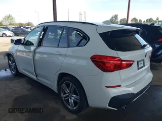 2018 BMW X1 xDrive28i with VIN WBXHT3C36J5K26486, listed as a IAAI auction lot 41839817 with 65,835 mi miles. Bid and sale history available at carsss.com. Image 3.