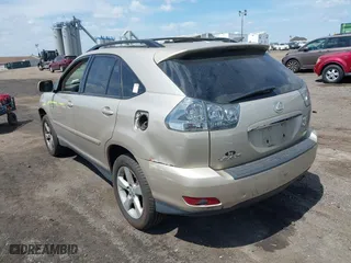 2004 Lexus RX 330 with VIN JTJHA31U340025819, listed as a IAAI auction lot 42038853 with 136,252 mi miles. Bid and sale history available at carsss.com. Image 3.