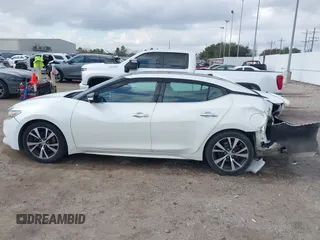 2016 Nissan Maxima SL z VIN 1N4AA6AP8GC403657, wystawiony jako IAAI lot #41506188 z przebiegiem 97 935 mil mil oraz . Historia ofert i sprzedaży dostępna na DreamBid. Obrazek 14.