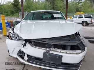 2016 Volkswagen Passat SE z VIN 1VWBT7A32GC057162, wystawiony jako IAAI lot #42287908 z przebiegiem 32 127 mil mil oraz . Historia ofert i sprzedaży dostępna na DreamBid. Obrazek 13.