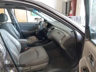 2000 Honda Accord EX z VIN 1HGCG1657YA053433, wystawiony jako IAAI lot #42322643 z przebiegiem 146 517 mil mil oraz . Historia ofert i sprzedaży dostępna na DreamBid. Obrazek 5.