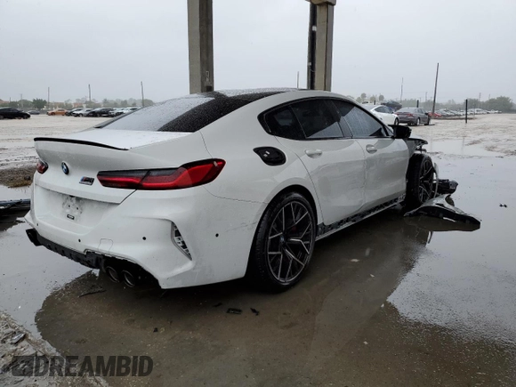 2022 BMW M8 Competition z VIN WBSGV0C01NCJ53223, wystawiony jako Copart lot #76250753 z przebiegiem 25 966 mil mil oraz . Historia ofert i sprzedaży dostępna na DreamBid. Obrazek 3.