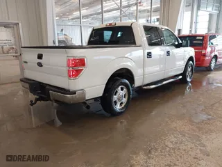2013 Ford F-150 XL with VIN 1FTFW1CTXDFA62013, listed as a IAAI auction lot 41645531 with 185,555 mi miles. Bid and sale history available at carsss.com. Image 4.
