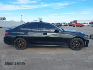2022 BMW 3 Series M340i xDrive with VIN WBA5U9C08NFM68599, listed as a IAAI auction lot 41260340 with Not Provided miles and . Bid and sale history available at DreamBid. Image 13.