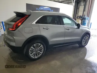 2024 Cadillac XT4 FWD Premium Luxury z VIN 1GYFZCR49RF126367, wystawiony jako Copart lot #60196465 z przebiegiem 40 827 mil mil oraz Czysty tytuł • Clean title. Historia ofert i sprzedaży dostępna na DreamBid. Obrazek 3.