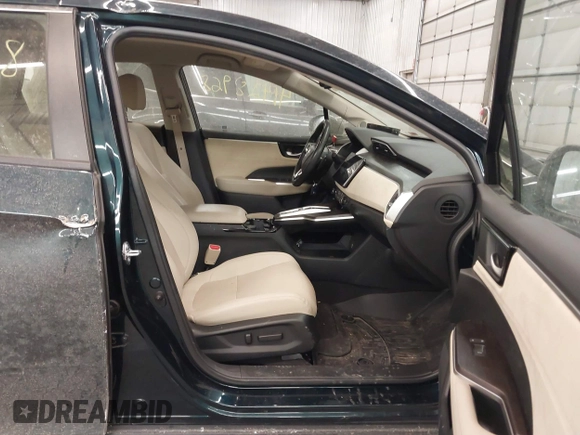 2018 Honda Clarity Touring z VIN JHMZC5F39JC002521, wystawiony jako IAAI lot #41428968 z przebiegiem 64 014 mil mil oraz . Historia ofert i sprzedaży dostępna na DreamBid. Obrazek 5.