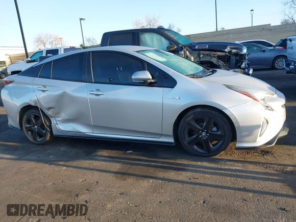 2017 Toyota Prius Two with VIN JTDKARFU3H3049806, listed as a IAAI auction lot 41811825 with 94,453 mi miles. Bid and sale history available at carsss.com. Image 13.