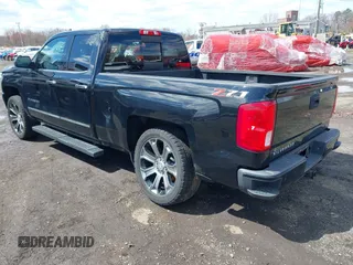 2018 Chevrolet Silverado 1500 with VIN 1GCVKSEC3JZ125571, listed as a IAAI auction lot 41982881 with 58,410 mi miles and . Bid and sale history available at DreamBid. Image 3.