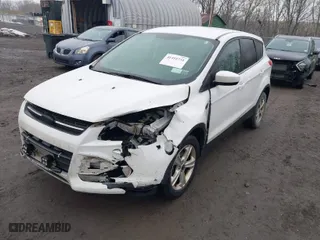 2015 Ford Escape SE with VIN 1FMCU9GX7FUB50189, listed as a IAAI auction lot 41451731 with 234,811 mi miles. Bid and sale history available at carsss.com. Image 2.
