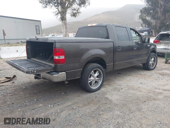 2005 Ford F-150 XLT with VIN 1FTRW12W15KE64553, listed as a IAAI auction lot 42009373 with 106,454 mi miles. Bid and sale history available at carsss.com. Image 4.