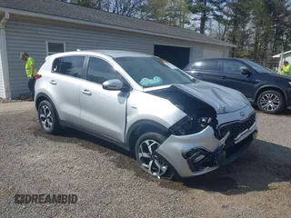 2020 Kia Sportage LX z VIN KNDPMCAC2L7801893, wystawiony jako IAAI lot #42039937 z przebiegiem 57 771 mil mil oraz . Historia ofert i sprzedaży dostępna na DreamBid. Obrazek 1.