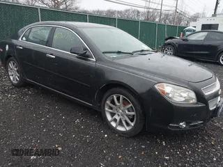 2012 Chevrolet Malibu LTZ with VIN 1G1ZG5E74CF285866, listed as a IAAI auction lot 41948279 with Not Provided miles and . Bid and sale history available at DreamBid. Image 1.