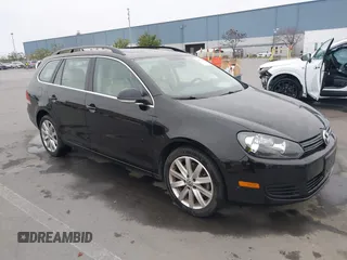 2012 Volkswagen Jetta SportWagen TDI with VIN 3VWPL7AJ3CM657816, listed as a IAAI auction lot 41473792 with 82,447 mi miles. Bid and sale history available at carsss.com. Image 1.