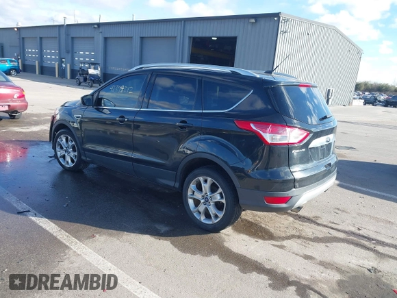 2015 Ford Escape Titanium with VIN 1FMCU0JX8FUC34459, listed as a IAAI auction lot 41394012 with 154,077 mi miles. Bid and sale history available at carsss.com. Image 3.