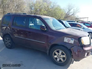 2011 Honda Pilot Touring with VIN 5FNYF4H91BB019009, listed as a IAAI auction lot 41827297 with 170,070 mi miles. Bid and sale history available at carsss.com. Image 6.