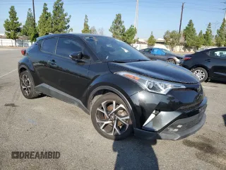 2018 Toyota C-HR XLE with VIN NMTKHMBX7JR022593, listed as a Copart auction lot 70659634 with 106,692 mi miles and Salvage Title. Bid and sale history available at carsss.com. Image 4.