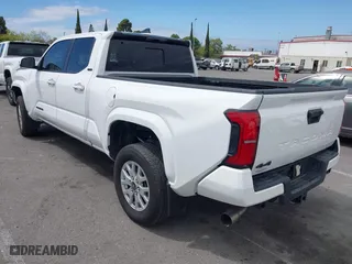2024 Toyota Tacoma 4WD SR5 with VIN 3TYLB5JN4RT009863, listed as a IAAI auction lot 42054379 with 8,360 mi miles. Bid and sale history available at carsss.com. Image 3.