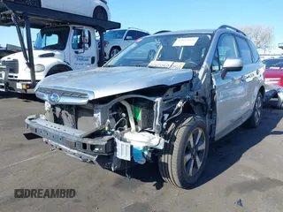 2018 Subaru Forester Limited with VIN JF2SJARC4JH435231, listed as a IAAI auction lot 42011028 with 51,901 mi miles. Bid and sale history available at carsss.com. Image 2.