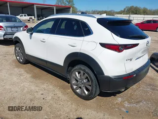 2022 Mazda CX-30 S Premium with VIN 3MVDMBDL1NM413540, listed as a IAAI auction lot 41681191 with 57,764 mi miles and . Bid and sale history available at carsss.com. Image 3.