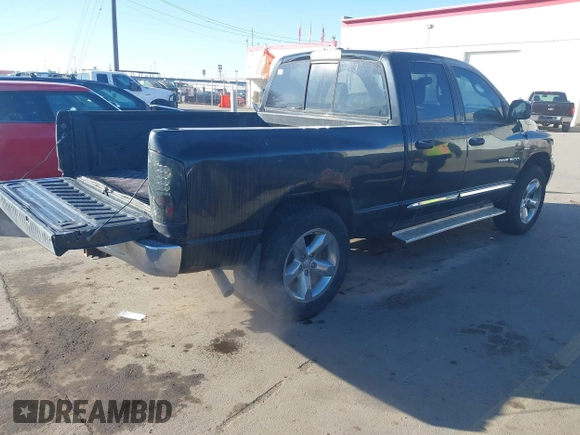 2006 Dodge Ram 1500 SLT with VIN 1D7HU18256S647953, listed as a IAAI auction lot 41430894 with 209,656 mi miles. Bid and sale history available at carsss.com. Image 4.