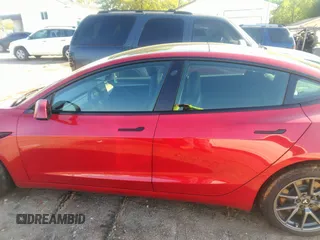 2022 Tesla Model 3 Long Range with VIN 5YJ3E1EB4NF171972, listed as a IAAI auction lot 42026031 with 40,489 mi miles and . Bid and sale history available at DreamBid. Image 13.