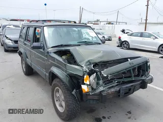 1996 Jeep Cherokee Sport z VIN 1J4FT68S6TL267408, wystawiony jako IAAI lot #42385629 z przebiegiem 268 753 mil mil oraz . Historia ofert i sprzedaży dostępna na DreamBid. Obrazek 6.
