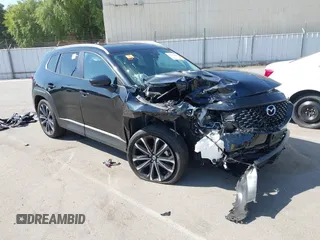 2023 Mazda CX-50 Meridian Edition with VIN 7MMVABXY1PN149136, listed as a IAAI auction lot 42587764 with 4,748 mi miles and . Bid and sale history available at DreamBid. Image 1.