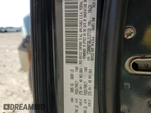 2020 Ram 1500 Tradesman with VIN 1C6RR6FG6LS127159, listed as a Copart auction lot 52411415 with 131,659 mi miles and Salvage title. Bid and sale history available at DreamBid. Image 12.