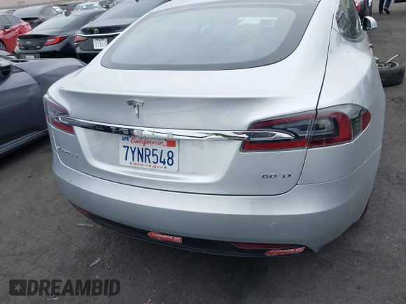 2017 Tesla Model S 100D with VIN 5YJSA1E24HF193563, listed as a IAAI auction lot 42120120 with 60,391 mi miles and . Bid and sale history available at DreamBid. Image 17.