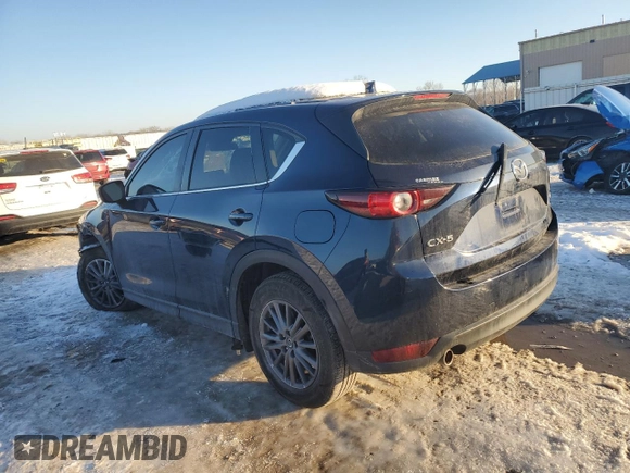2021 Mazda CX-5 Touring with VIN JM3KFACM2M0329646, listed as a Copart auction lot 88217245 with 46,864 mi miles and Salvage Title. Bid and sale history available at carsss.com. Image 2.