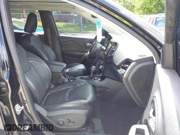 2019 Jeep Cherokee Limited z VIN 1C4PJLDNXKD128289, wystawiony jako IAAI lot #42335271 z przebiegiem 77 523 mil mil oraz . Historia ofert i sprzedaży dostępna na DreamBid. Obrazek 5.
