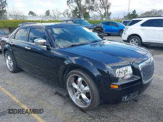 2007 Chrysler 300 with VIN 2C3KA43R57H852331, listed as a IAAI auction lot 41946742 with 211,168 mi miles. Bid and sale history available at carsss.com. Image 1.