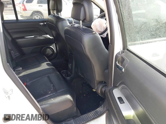 2015 Jeep Compass High Altitude Edition with VIN 1C4NJDEB9FD396239, listed as a IAAI auction lot 41451090 with 86,826 mi miles. Bid and sale history available at carsss.com. Image 8.