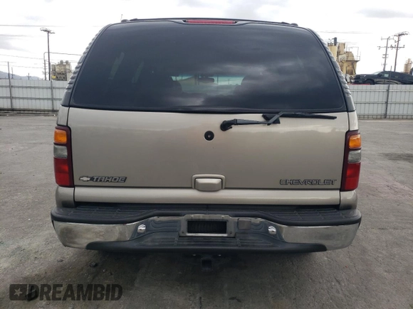 2001 Chevrolet Tahoe LS z VIN 1GNEC13T81R152119, wystawiony jako Copart lot #51171165 z przebiegiem 191 740 mil mil oraz Czysty tytuł • Clean title. Historia ofert i sprzedaży dostępna na DreamBid. Obrazek 6.