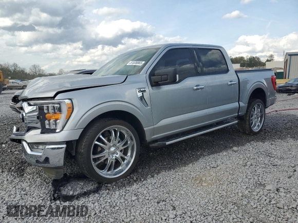 2023 Ford F-150 XL with VIN 1FTEW1C50PKF91124, listed as a Copart auction lot 51538865 with 22,128 mi miles and Salvage title. Bid and sale history available at DreamBid. Image 1.