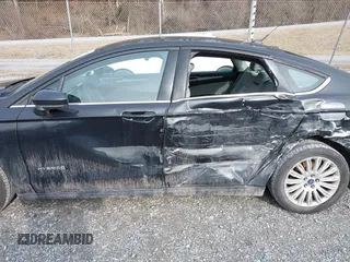 2015 Ford Fusion S Hybrid with VIN 3FA6P0UU8FR283233, listed as a IAAI auction lot 41501282 with 190,809 mi miles. Bid and sale history available at carsss.com. Image 6.