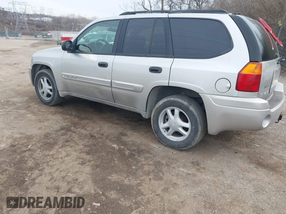 2004 GMC Envoy SLE with VIN 1GKDT13S142219365, listed as a IAAI auction lot 41612594 with 72,292 mi miles. Bid and sale history available at carsss.com. Image 3.