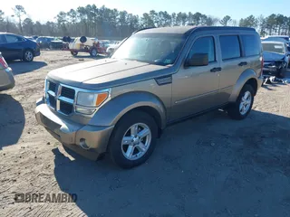 2007 Dodge Nitro SLT with VIN 1D8GU58K17W644847, listed as a IAAI auction lot 41462223 with 220,325 mi miles and . Bid and sale history available at carsss.com. Image 2.